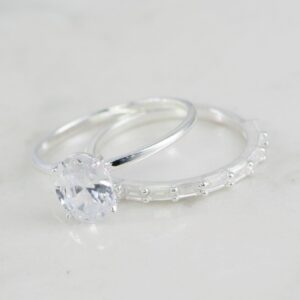 DUO DE ANILLOS CIRCON Y BAGUETTE